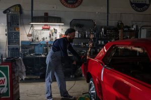 Mechanic working on a Nissan vehicle near Indianapolis, IN