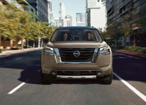 2023 Nissan Pathfinder driving on a dirt road near Indianapolis, Indiana