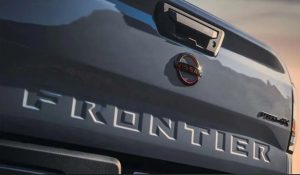 A close up photo of the back of a gray 2023 Nissan Frontier taken near Indianapolis, Indiana