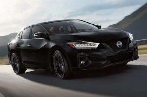 2023 Nissan Maxima driving near Indianapolis, IN