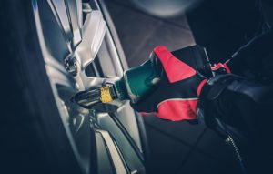 A mechanic performing tire service near indianapolis, indiana