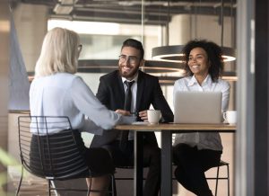 People discussing over a table near Indianapolis, Indiana