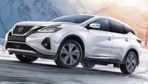A 2024 Nissan Murano driving down a snowy road near Indianapolis, Indiana