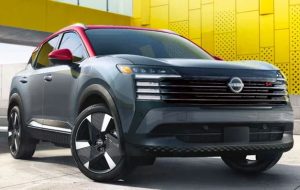 A 2025 Nissna Kicks parked on concrete in front of a yellow brick wall near Indianapolis, Indiana