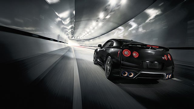 2023 Nissan GT-R seen from behind driving through a tunnel | Ed Martin Nissan in Indianapolis IN