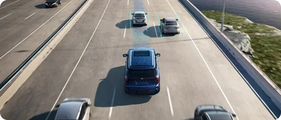 Overhead view of a 2026 Nissan Armada PRO-4X 4WD on a highway with sensor beams tracking the vehicles ahead, illustrating ProPILOT Assist