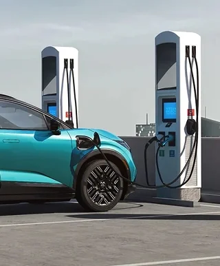 Nissan LEAF parked at a DC fast-charging station