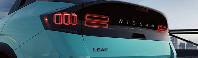Close-up of the rear light bar and LEAF badge on a turquoise 2026 Nissan LEAF