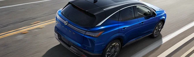 Overhead rear view of a blue 2026 Nissan Murano on the highway