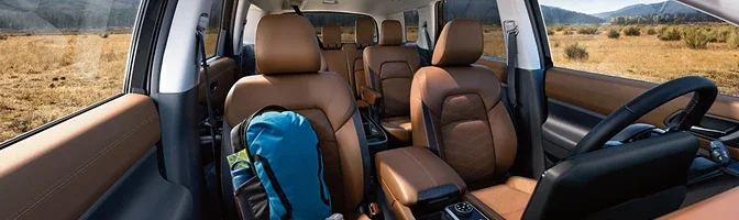 Interior of the 2026 Nissan Pathfinder showing tan leather front and second-row seats