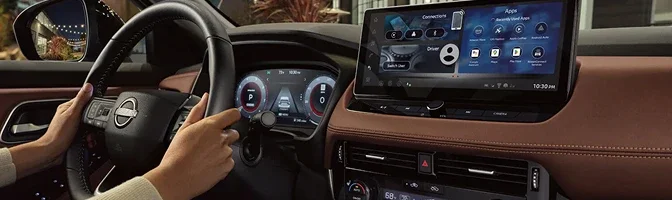 Driver's view of the Rogue steering wheel, gauges and center touchscreen