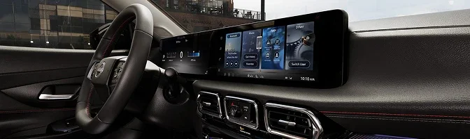 Sentra dashboard showing the wide center touchscreen and driver display